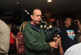 Bagpiper playing at Trinity Pub
